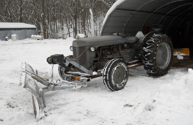 old tractor and plow